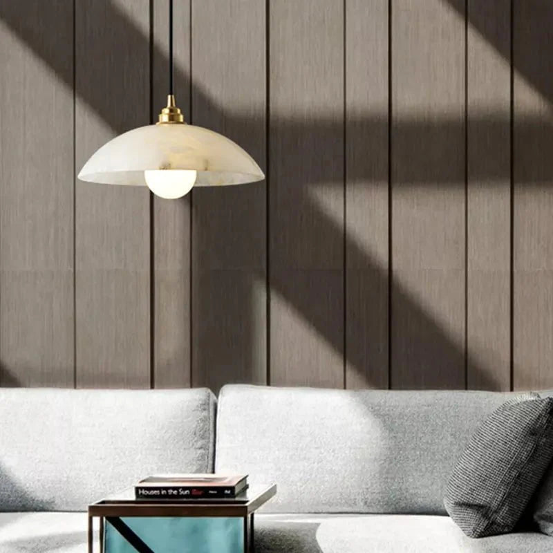 The Seraphina Luxe Pendant — Carved Marble with Vintage Brass Suspension