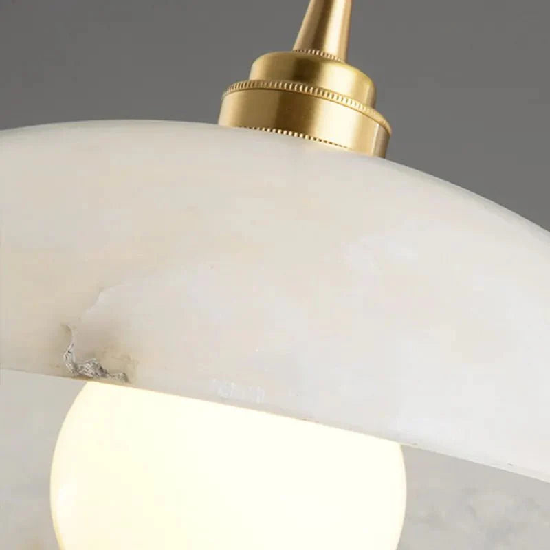 The Seraphina Luxe Pendant — Carved Marble with Vintage Brass Suspension