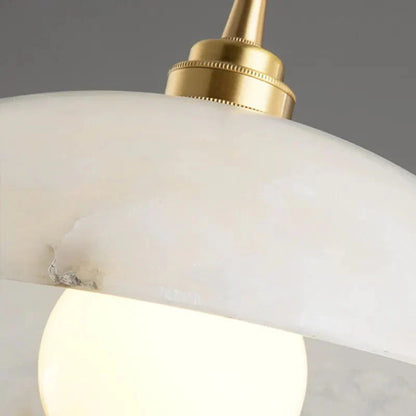 The Seraphina Luxe Pendant — Carved Marble with Vintage Brass Suspension