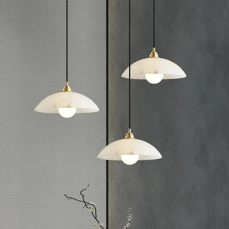 The Seraphina Luxe Pendant — Carved Marble with Vintage Brass Suspension